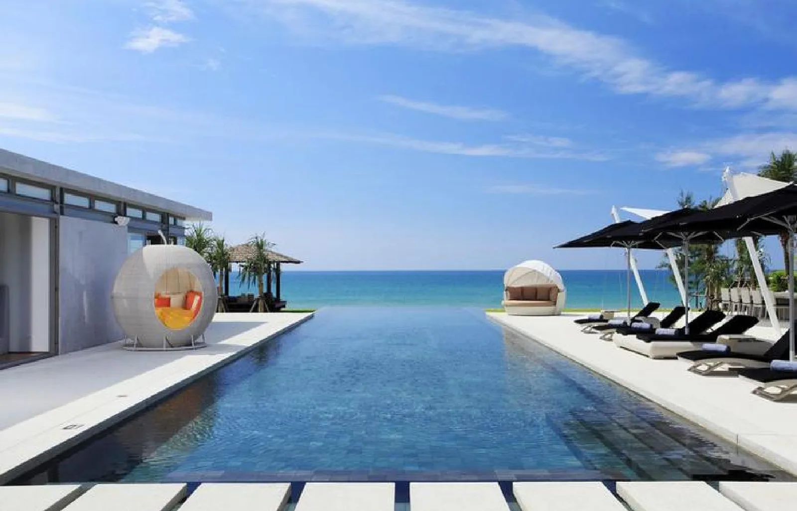 Sunlit villa pool terrace